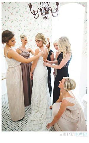 Bride and bridesmaids get ready for wedding. Image by Whitney Bower Imaging, featured on The Pink Bride www.thepinkbride.com {Touchy Wedding Situation #6: Mom vs. Stepmom}