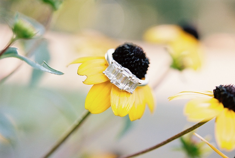 White gold wedding engagement ring on yellow flower, photographed by Michelle Lea Photographie | The Pink Bride® www.thepinkbride.com