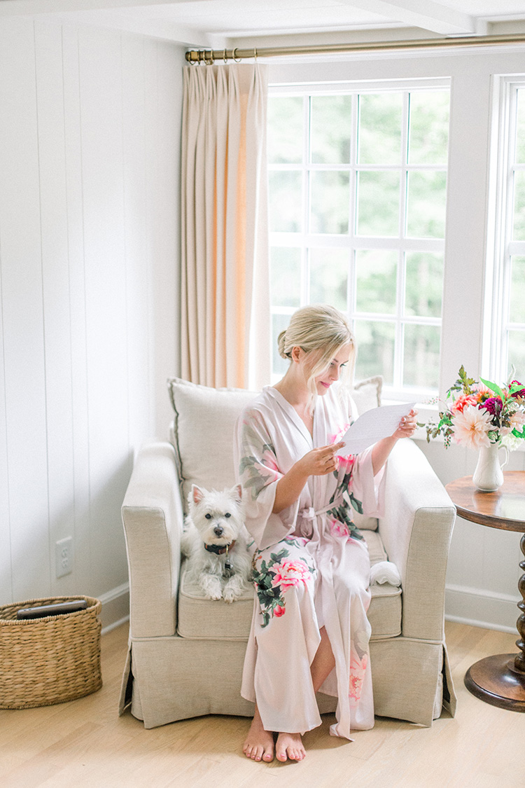 Bride Reading Letter with Puppy | 15 Wedding Day Morning Of Essentials | photo by Madeline Trent Photography | The Pink Bride® www.thepinkbride.com